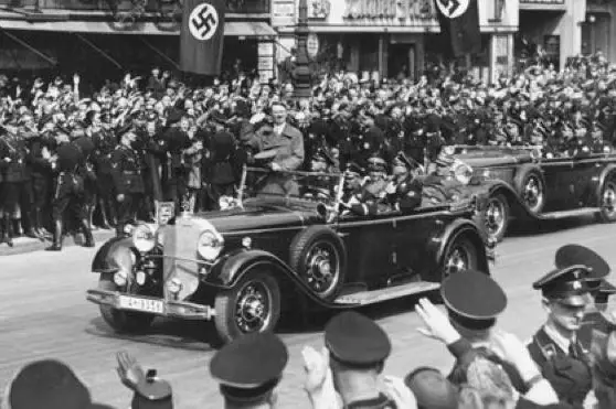 Hitler, in a different model Mercedes.